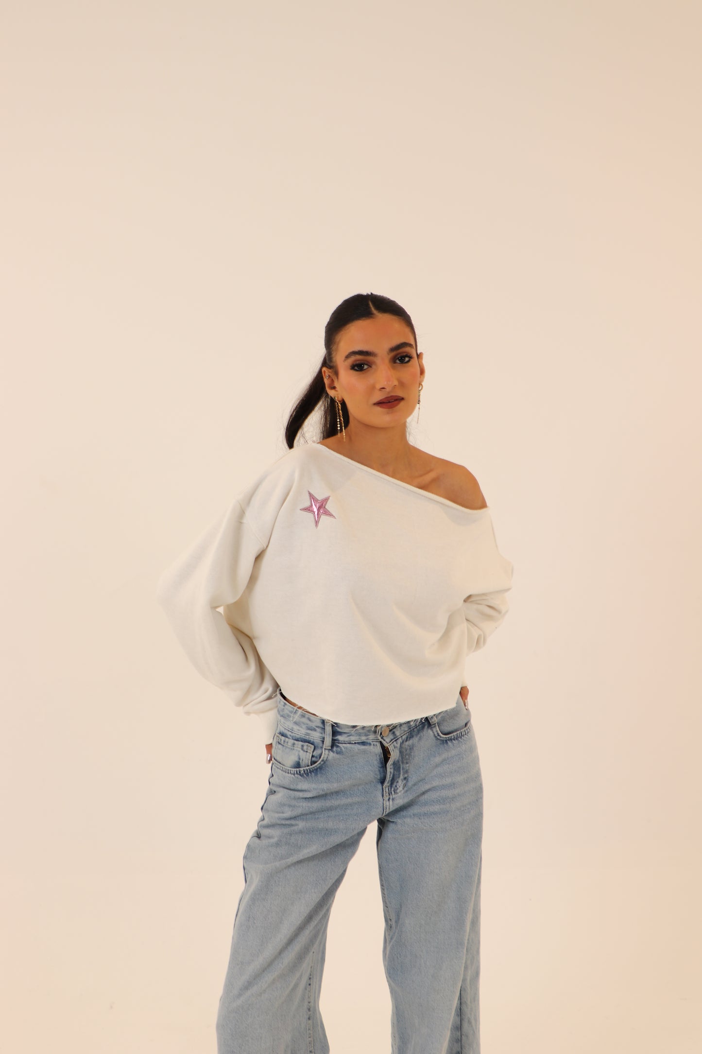 off-shoulder sweatshirt in white