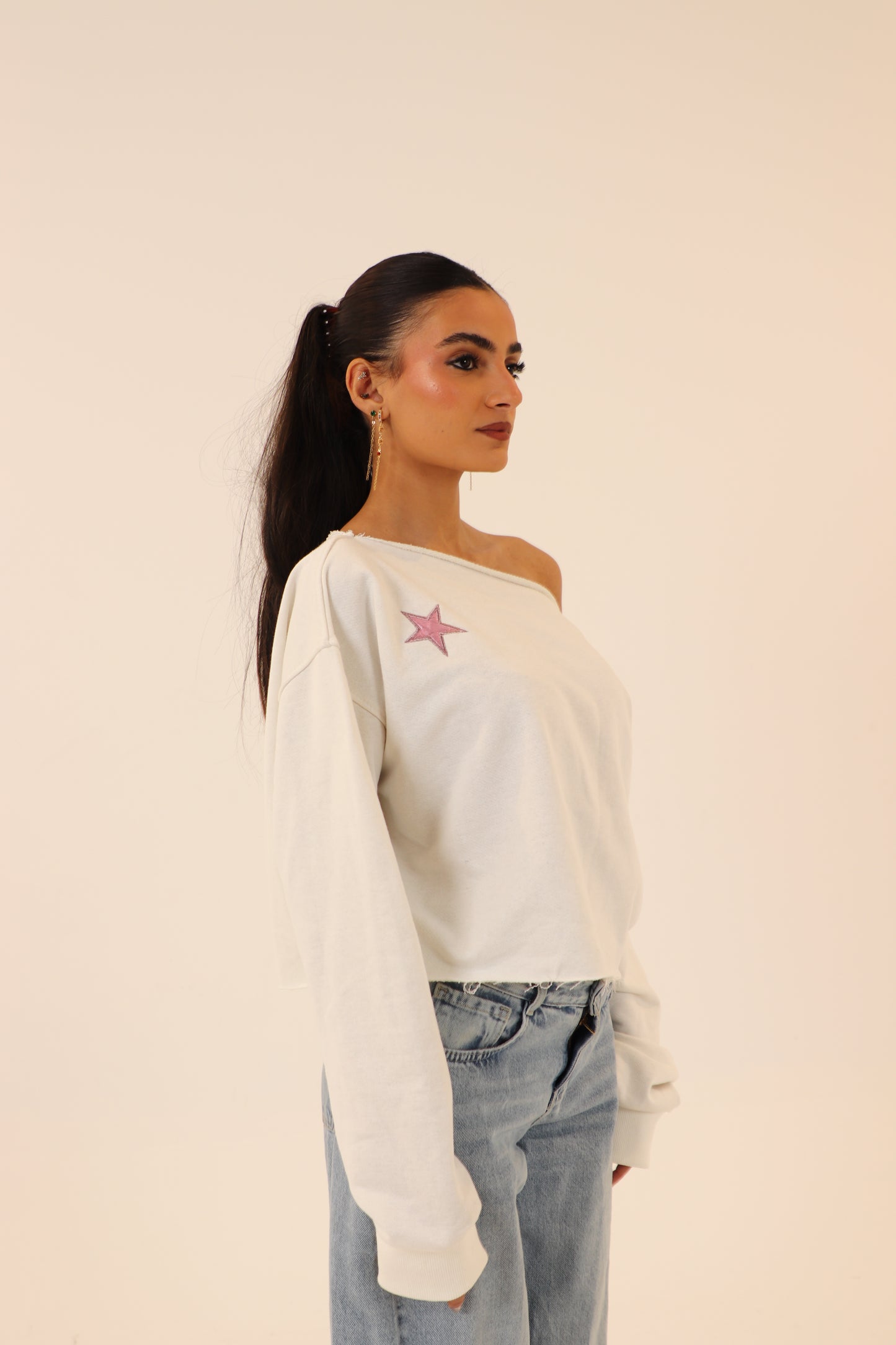 off-shoulder sweatshirt in white