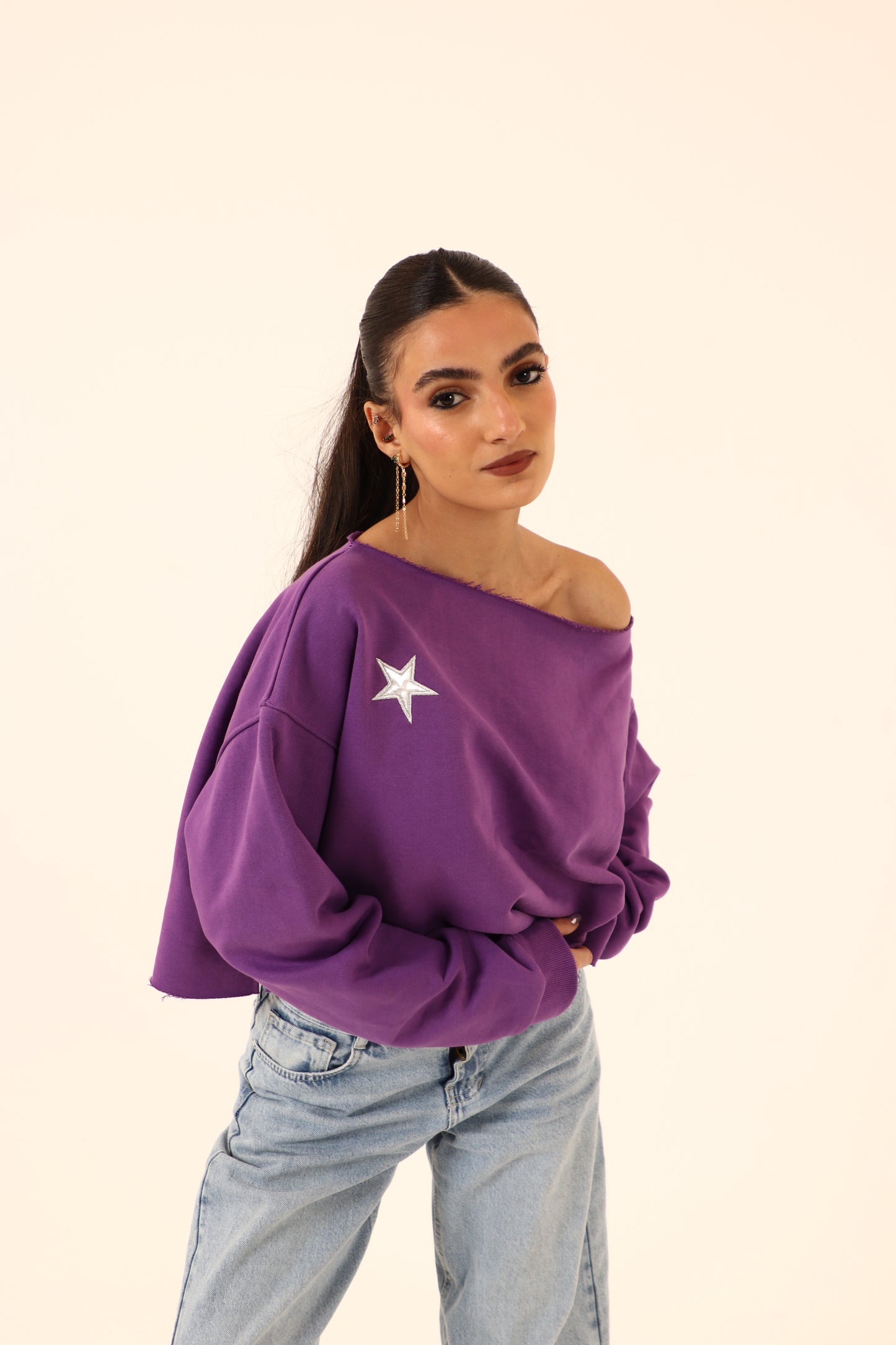 off-shoulder sweatshirt in purple