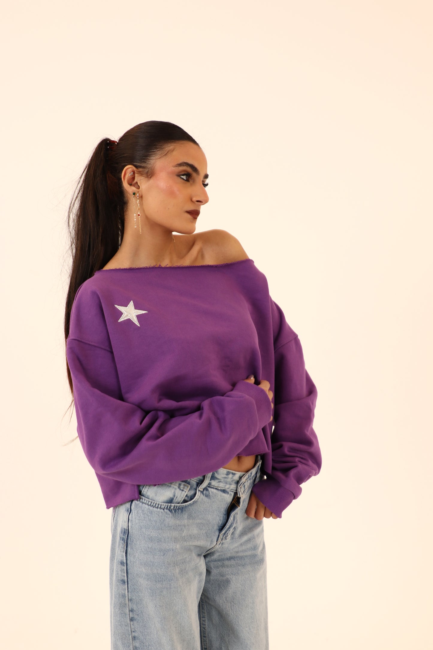 off-shoulder sweatshirt in purple