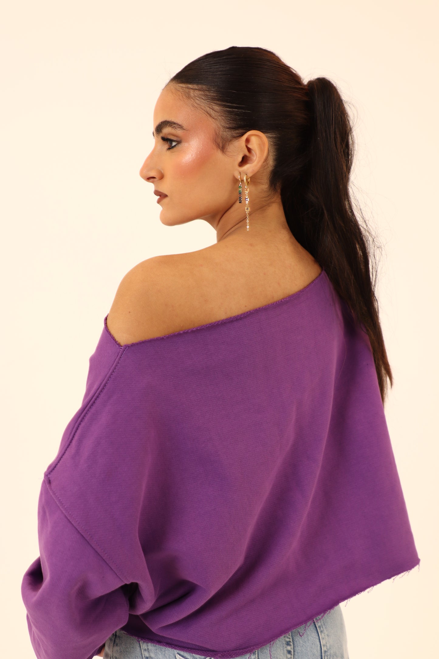 off-shoulder sweatshirt in purple